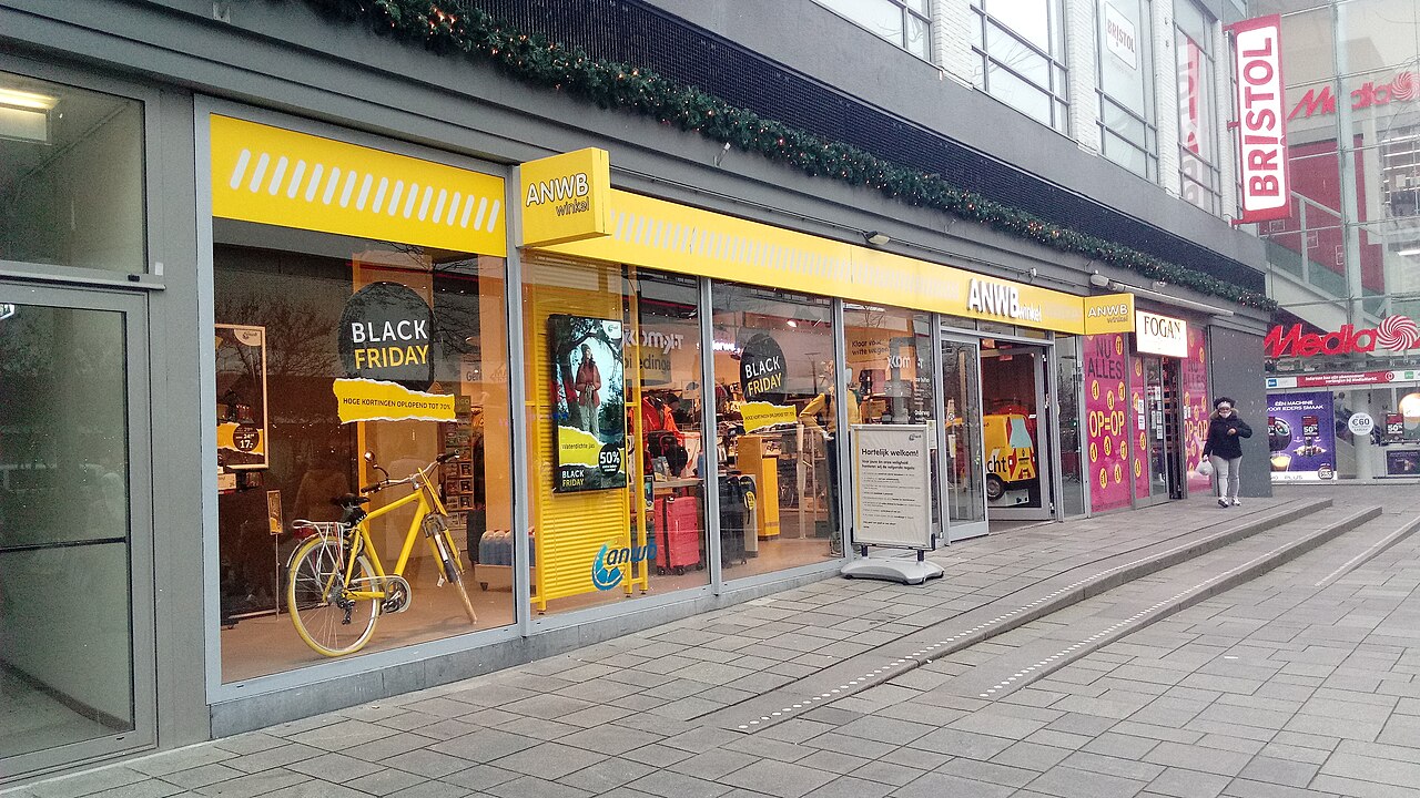 Storefront window with Black Friday promotion signs in Rotterdam