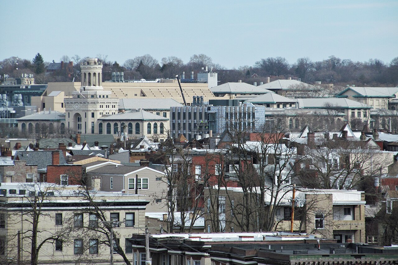 Carnegie Mellon University buildings seen above the rooftops of the Oakland neighborhood in Pittsburgh