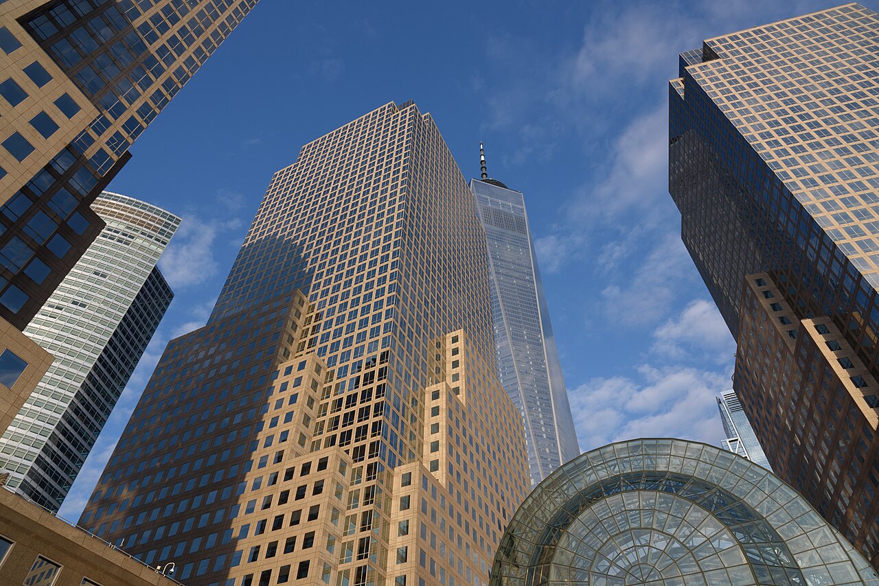 Looking up at office towers and a glass atrium at Brookfield Place in lower Manhattan