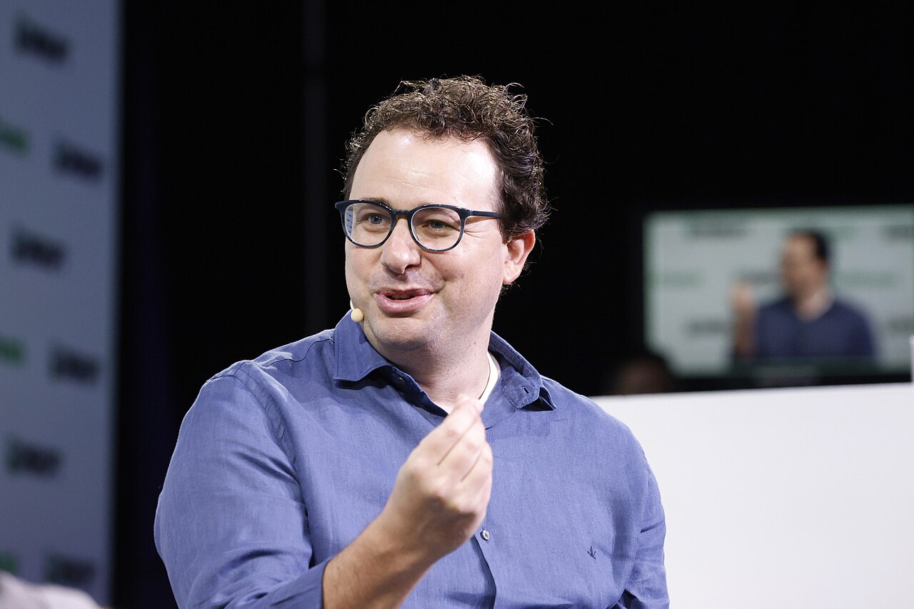Dario Amodei, co-founder and CEO of Anthropic, speaking on stage at TechCrunch Disrupt 2023