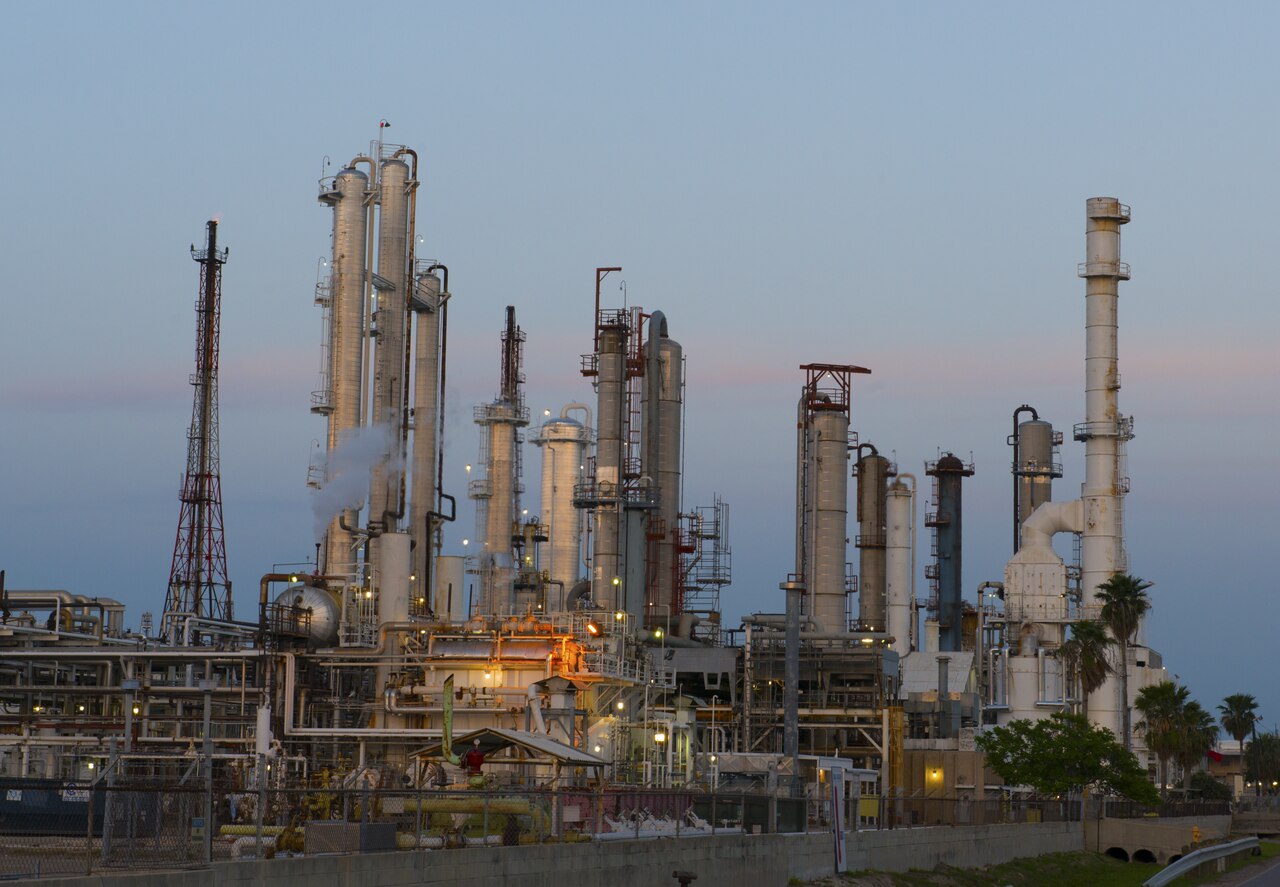 Industrial storage tanks and refinery infrastructure on Nueces Bay in Corpus Christi, Texas