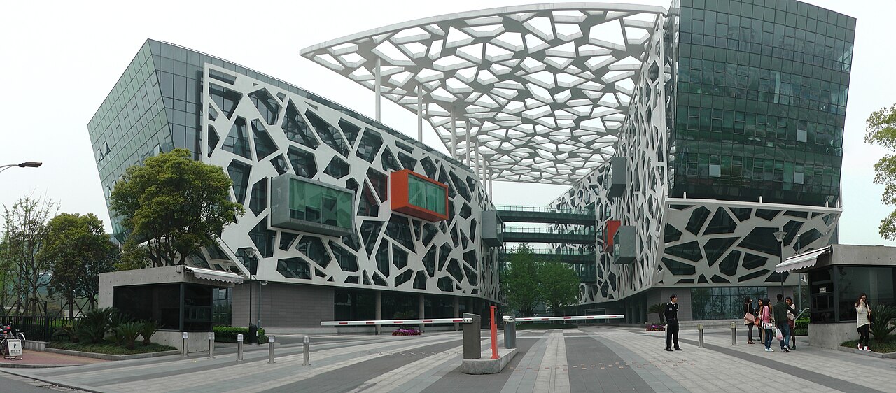 The distinctive latticed facade of Alibaba Group's headquarters campus in Hangzhou, China