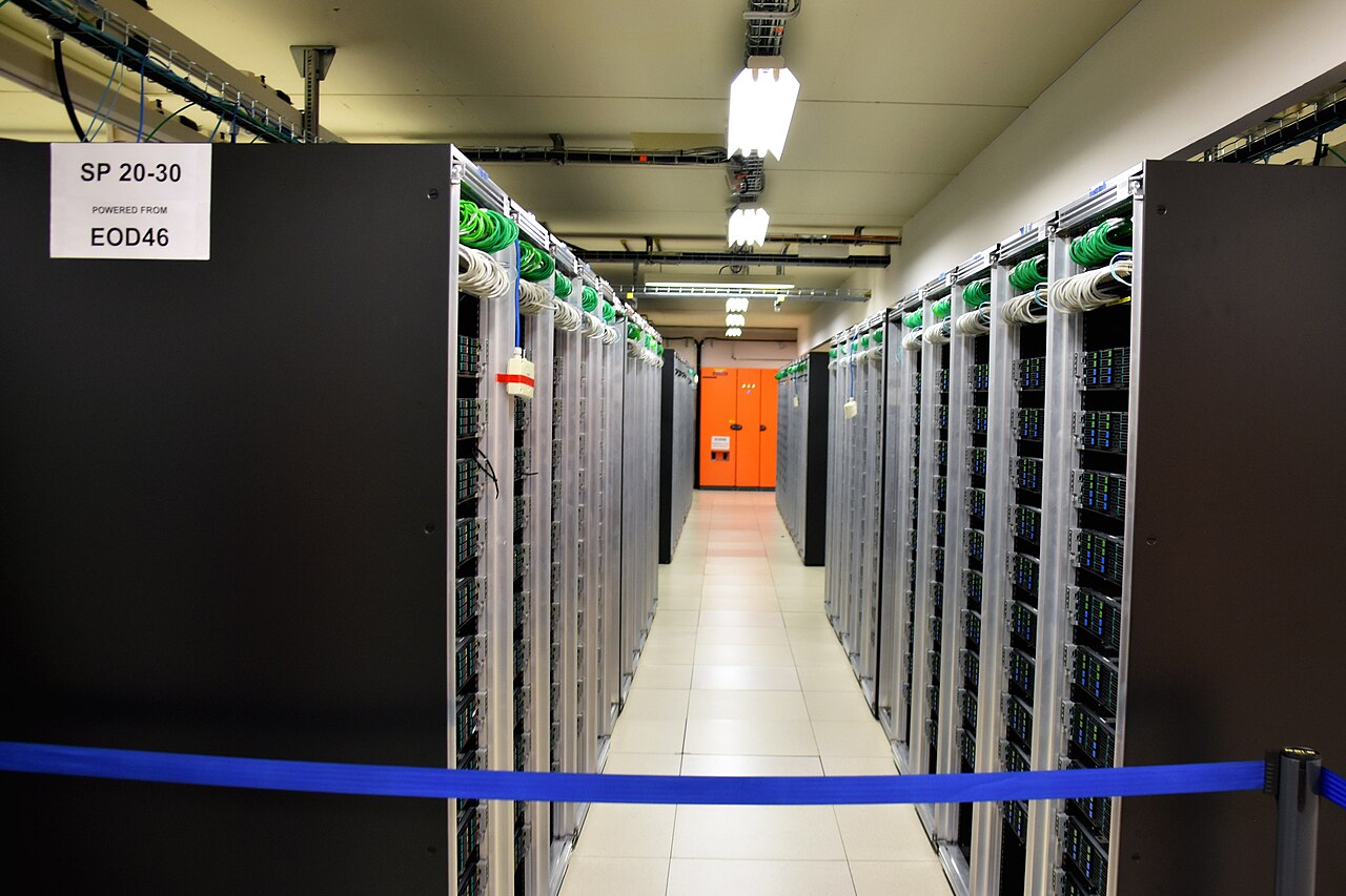 A row of server racks in a data center aisle