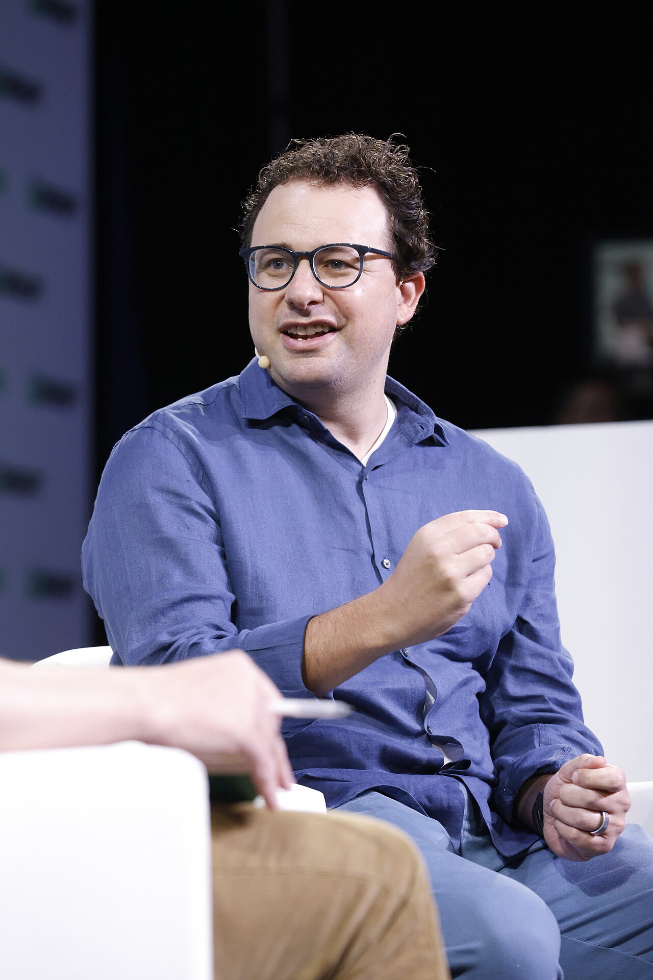 Dario Amodei, co-founder and CEO of Anthropic, speaking on stage at TechCrunch Disrupt 2023