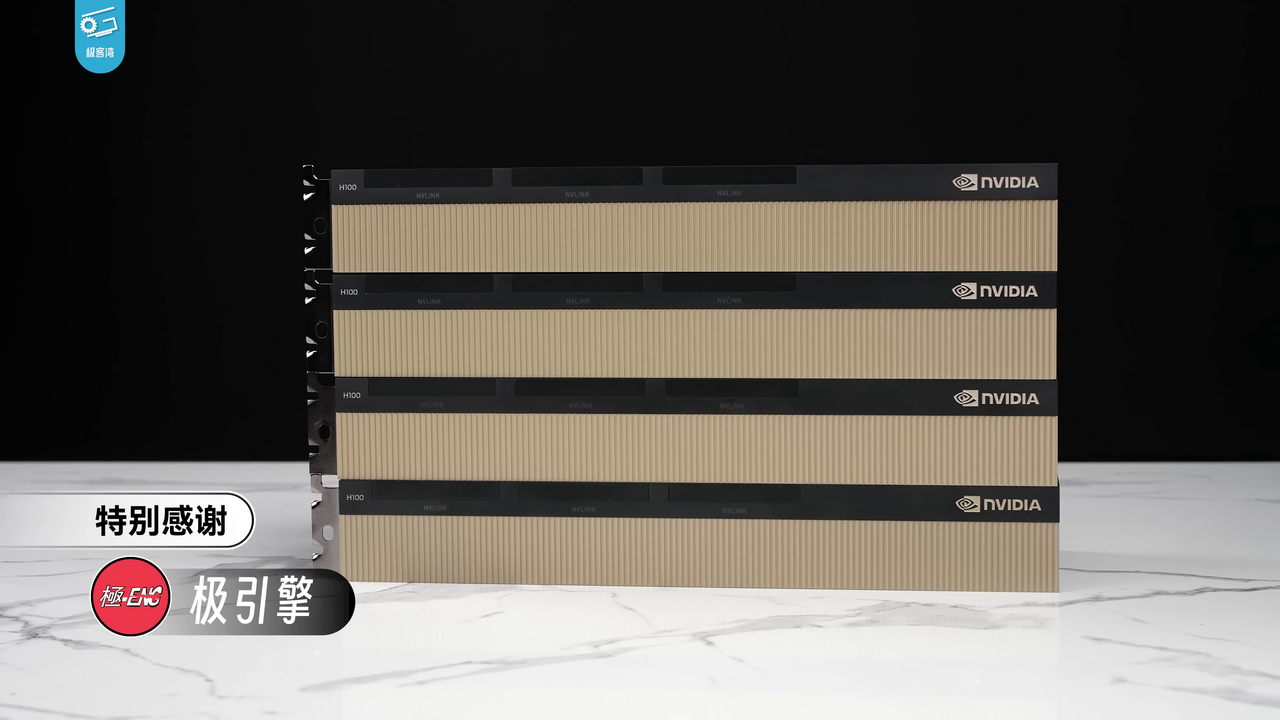 Four stacked NVIDIA H100 data-center GPU accelerator cards showing NVLink connectors and NVIDIA branding