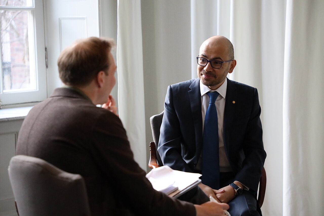 Demis Hassabis, co-founder of DeepMind, seated during an interview at the 2024 Nobel Week