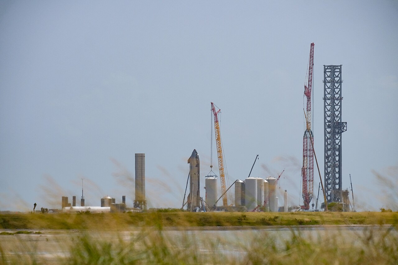SpaceX Starbase launch facility in Boca Chica, Texas, with a Starship prototype and the integration tower
