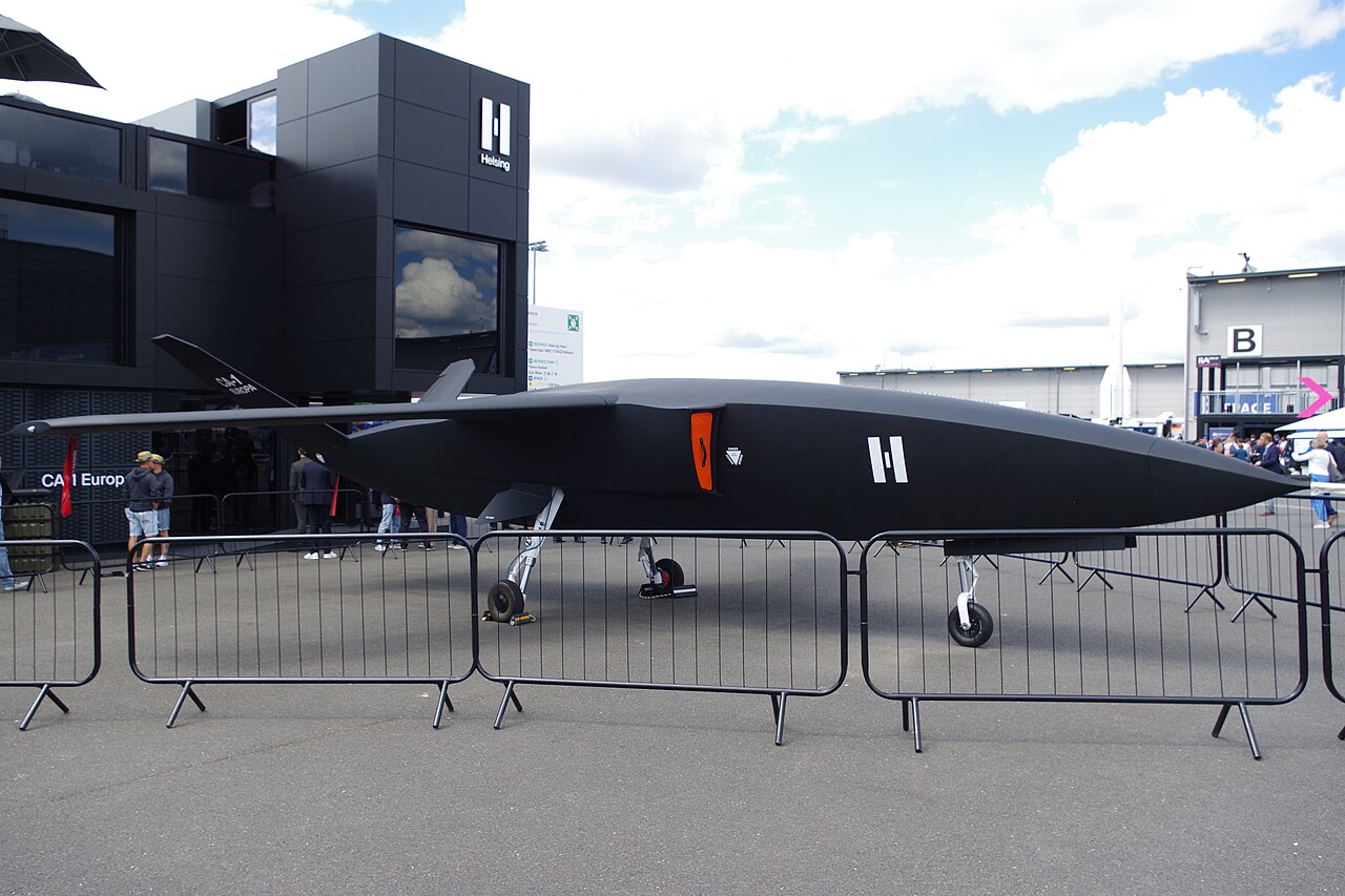 Side view of the Helsing CA-1 Europa uncrewed combat aircraft mock-up on display at the company's exhibition stand