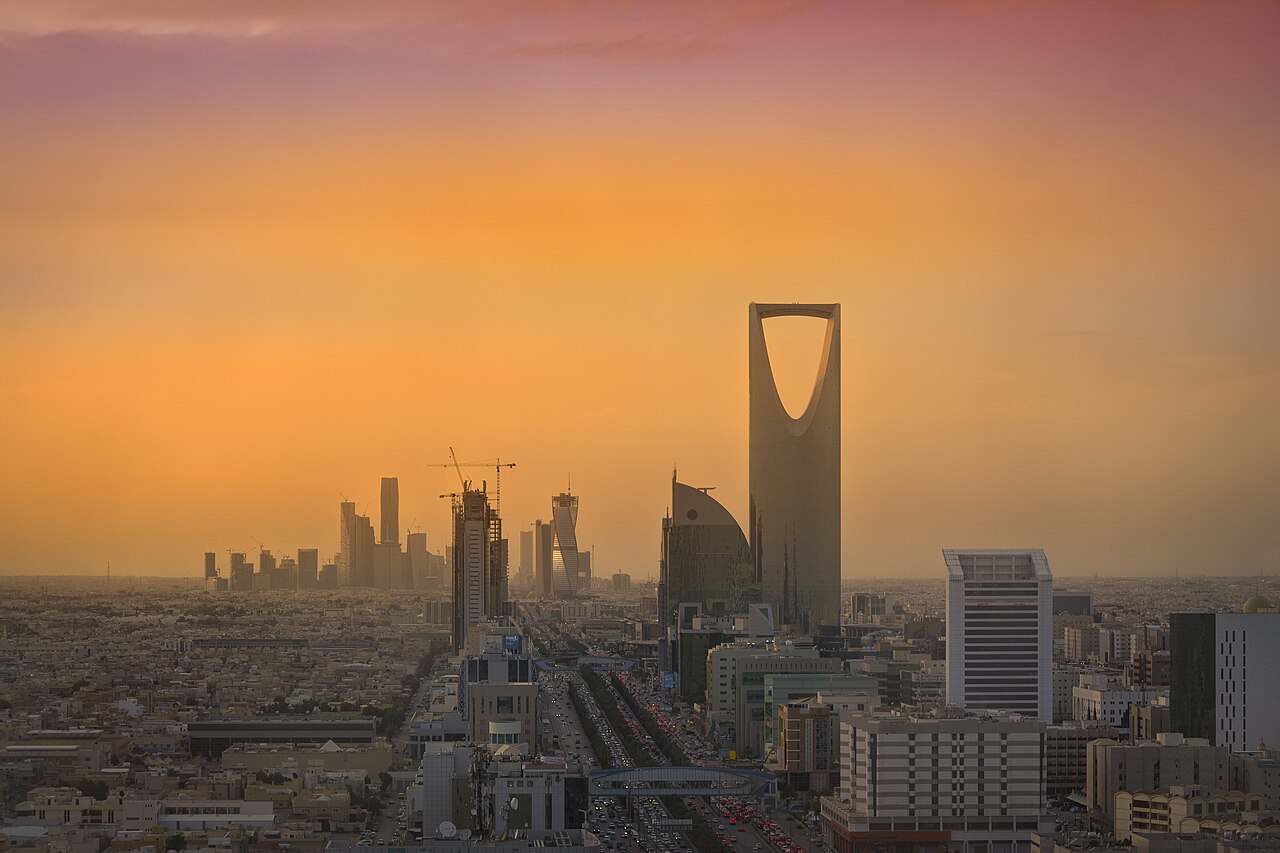 Riyadh skyline at sunset showing the Kingdom Tower and King Abdullah Financial District