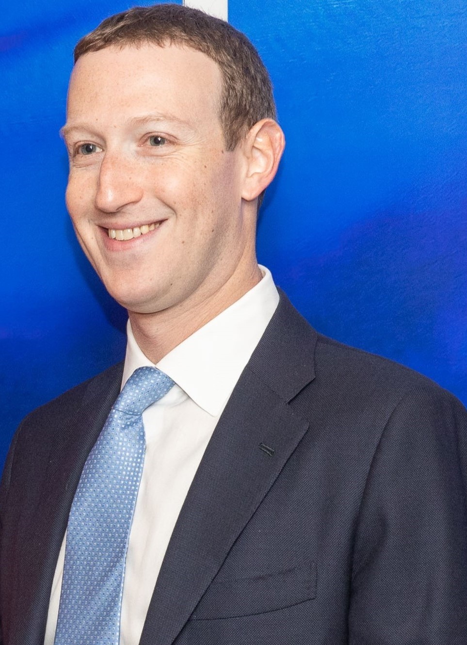 Mark Zuckerberg, chief executive of Meta, speaking at a company event against a blue backdrop