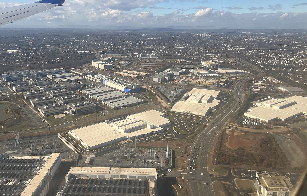Aerial view of large data center buildings and substations in Ashburn, Virginia