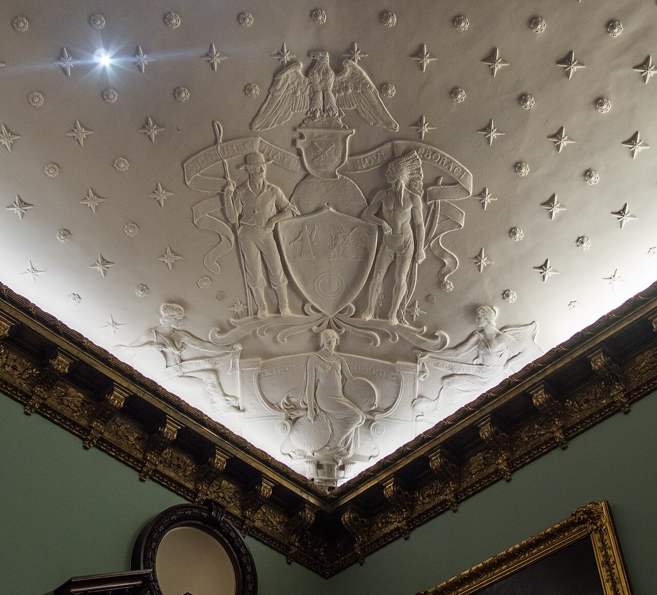 Plaster relief of the New York City coat of arms on the ceiling of the City Council Chamber in New York City Hall