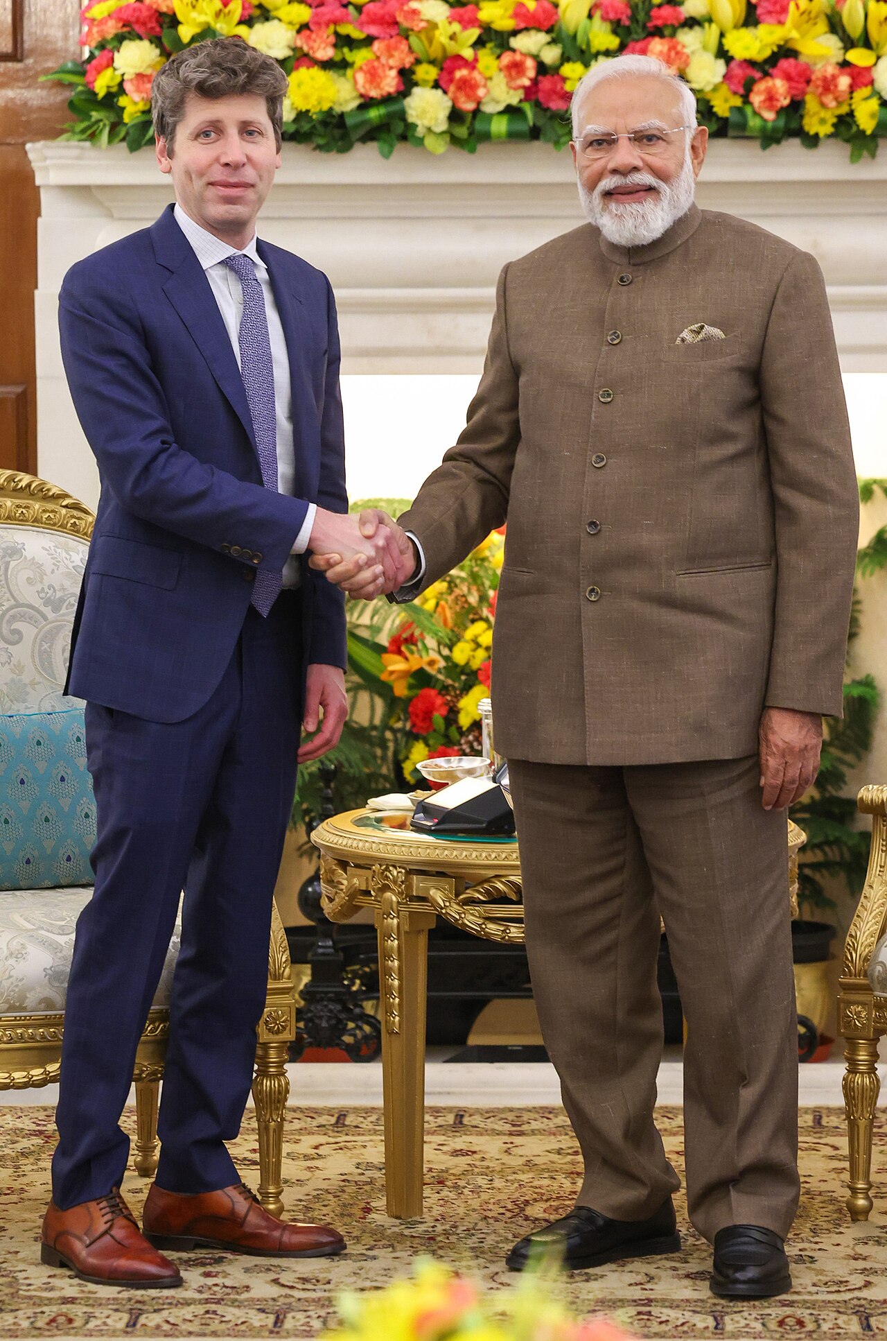 Sam Altman, CEO of OpenAI, shaking hands with Indian Prime Minister Narendra Modi during a meeting in New Delhi