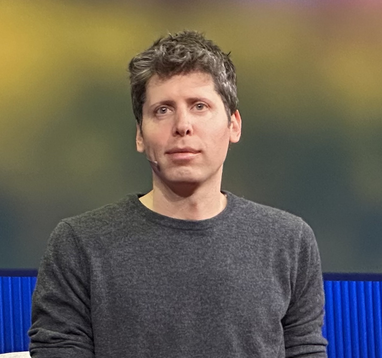 Sam Altman, OpenAI's CEO, speaking on stage at TED in April 2025