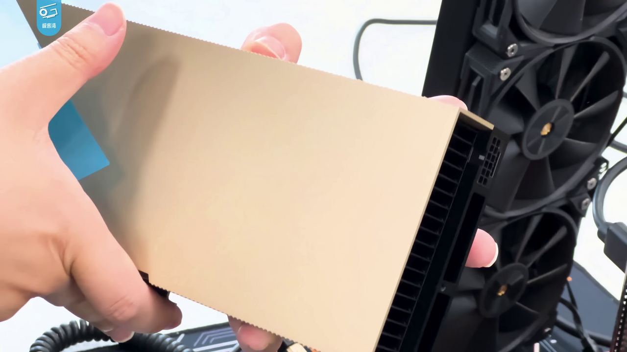 An Nvidia H100 data-center GPU held in one hand