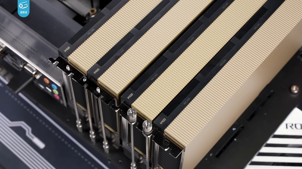 Close-up of NVIDIA H100 GPU accelerator modules installed in a server chassis