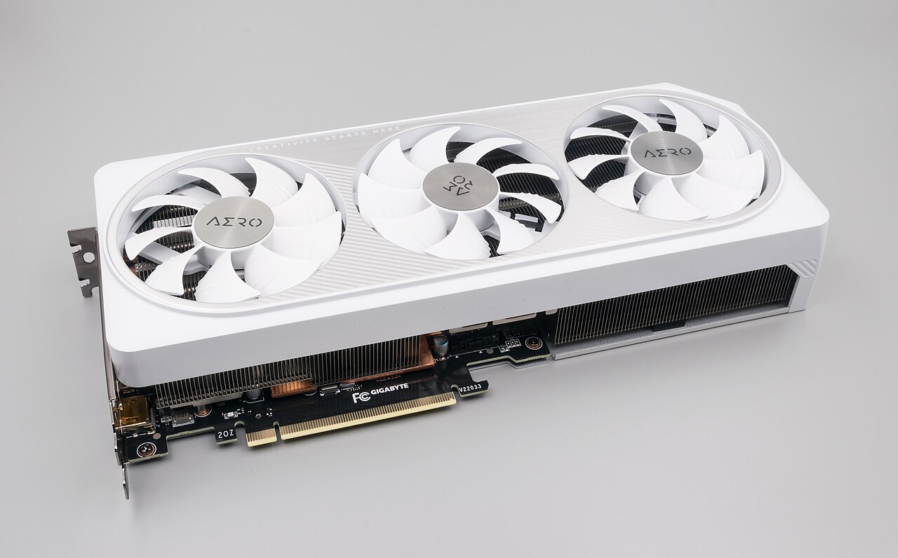 A white Gigabyte GeForce RTX 4070 Aero OC 12GB graphics card with three fans