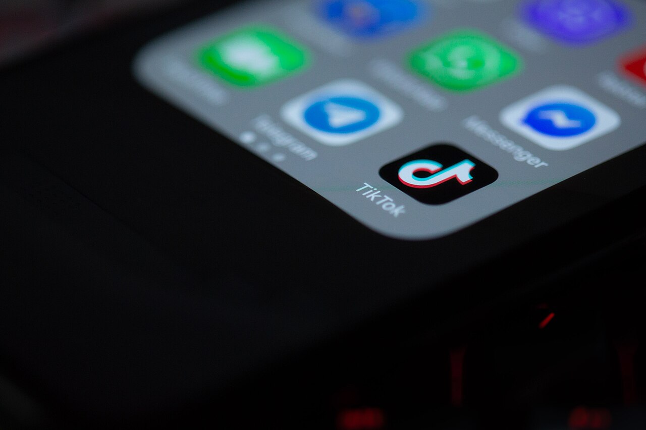 The TikTok app icon on a smartphone home screen