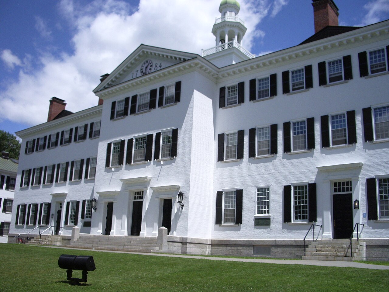 Dartmouth Hall, a white Georgian-style building with black shutters on the Dartmouth College campus in Hanover, New Hampshire